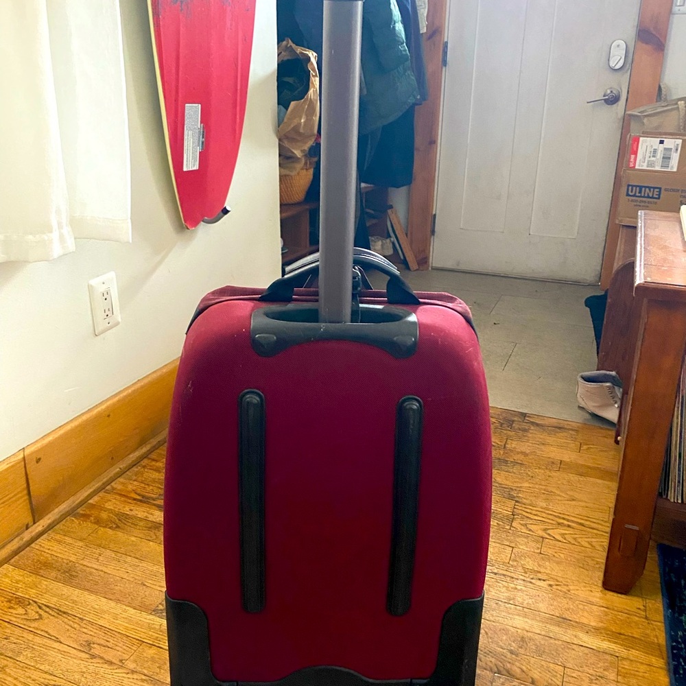 Vintage Patagonia burgundy rolling bag